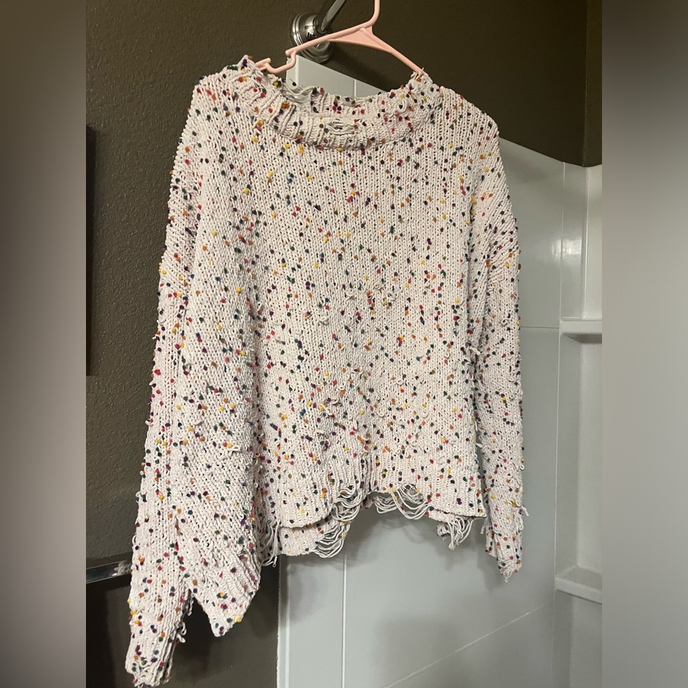 colorful & distressed women’s sweater